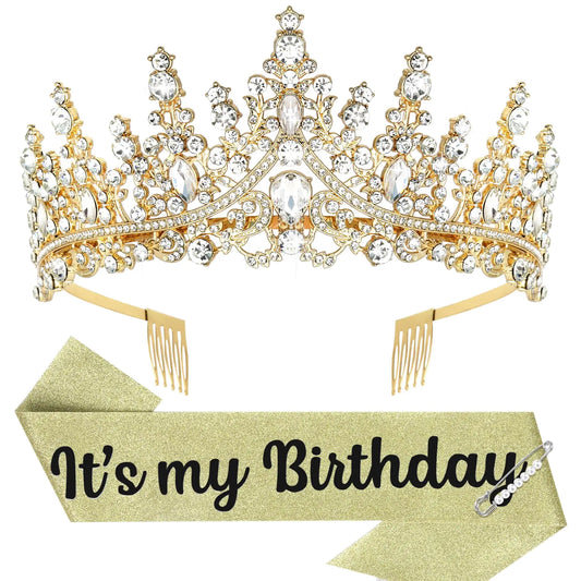 A gold-colored tiara with glittering rhinestones accompanied by a sash with the text 'It's my Birthday' printed on it.