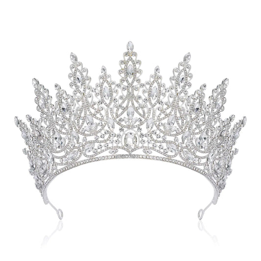 Silver tiara with intricate design on a white background