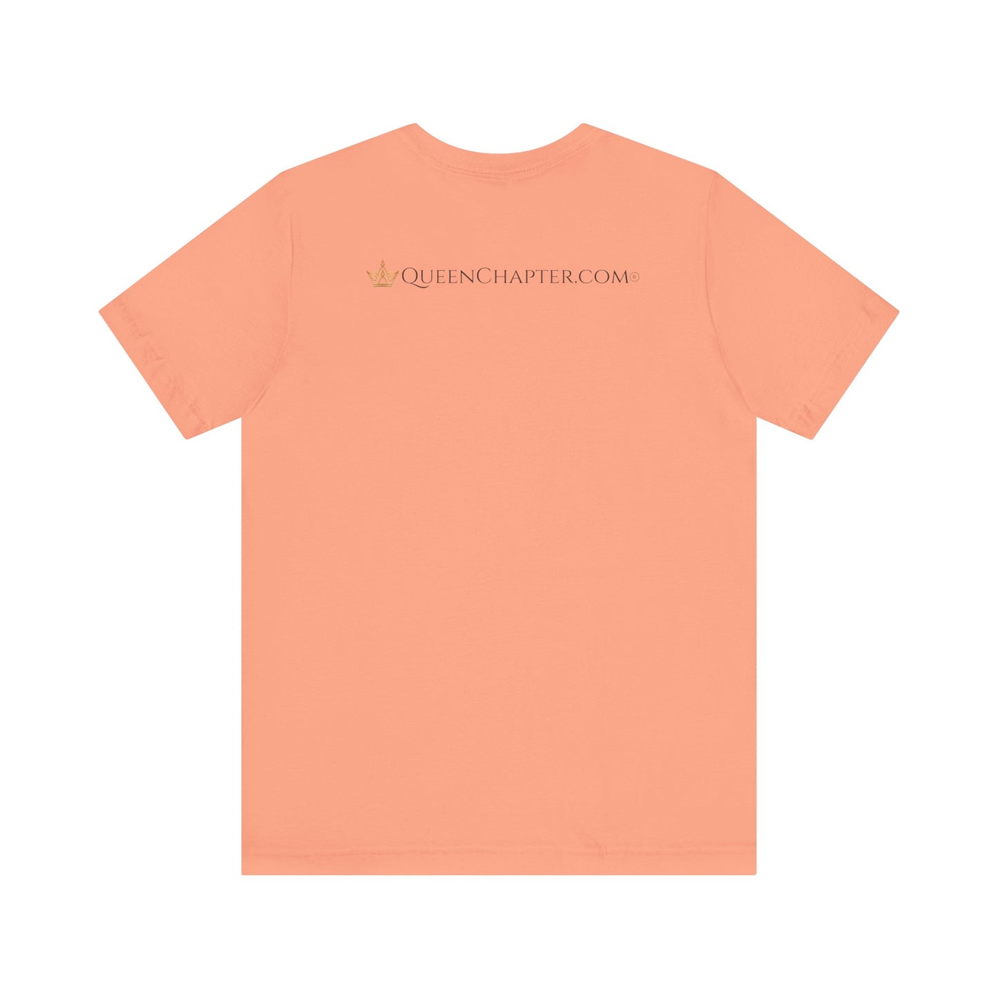 Peach-colored t-shirt with 'QUEENCHAPTER.COM' text on a white background