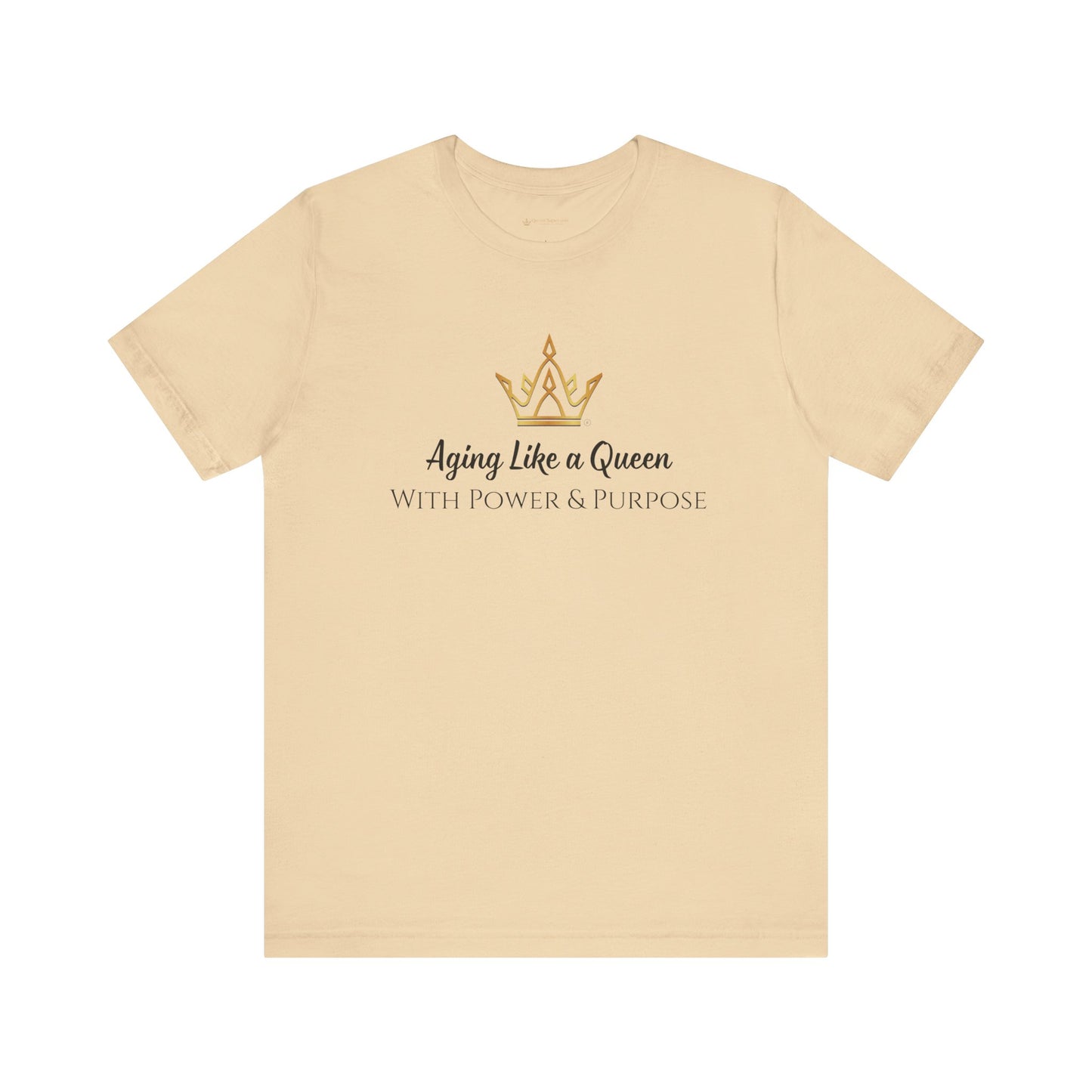 Beige t-shirt with 'Aging Like a Queen With Power & Purpose' text and crown logo on a white background