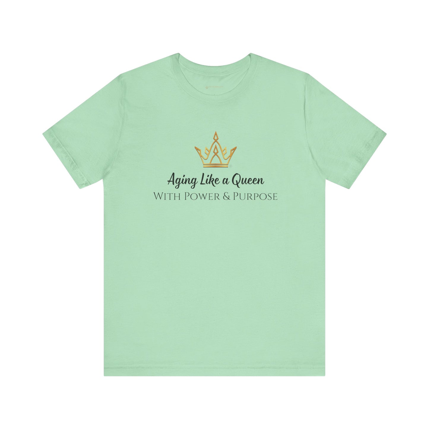 Mint green t-shirt with gold crown and text design on a white background