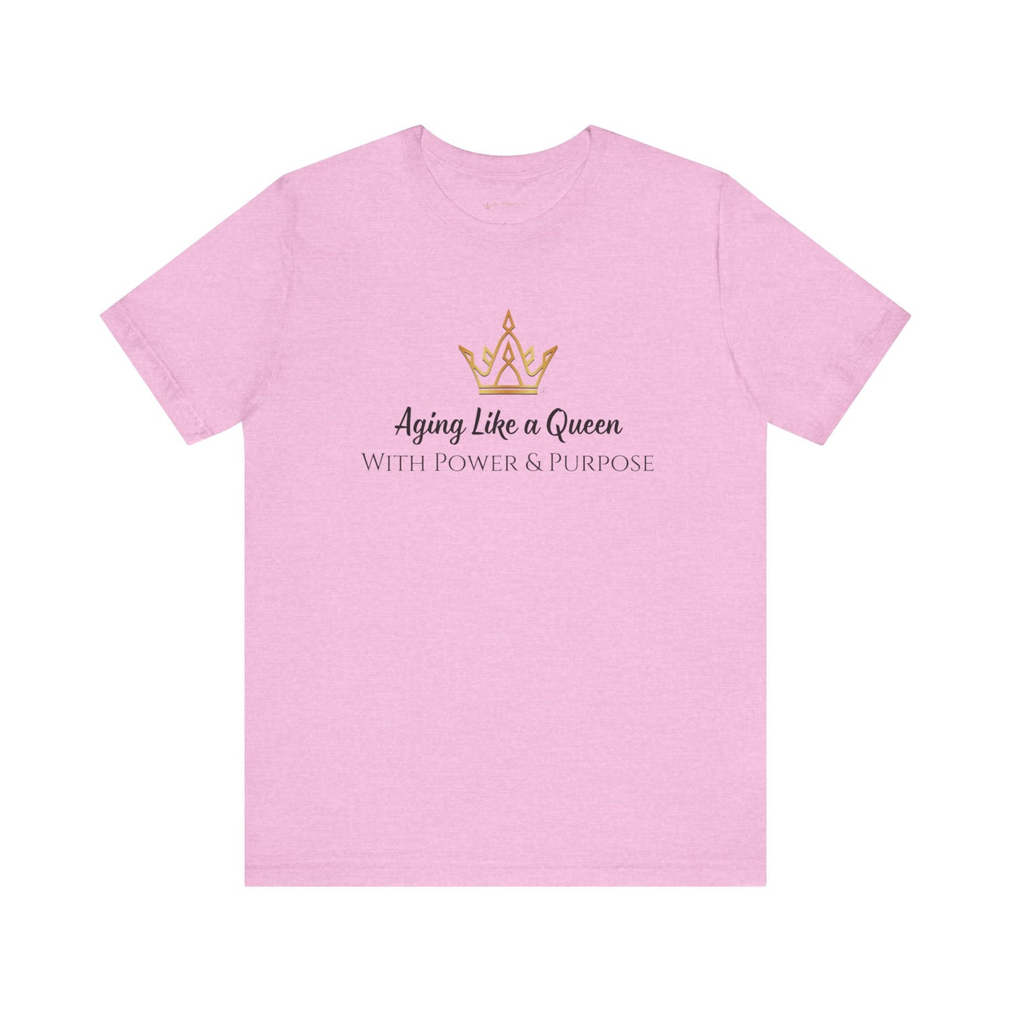 Pink t-shirt with a gold crown and text on a white background